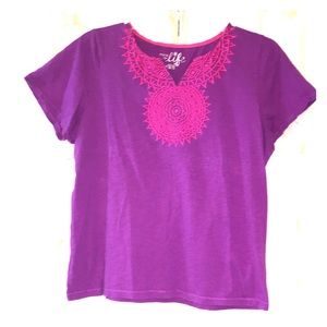 Medallion embellished workout top